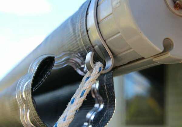 Close up of awning tie down clips securing awning
